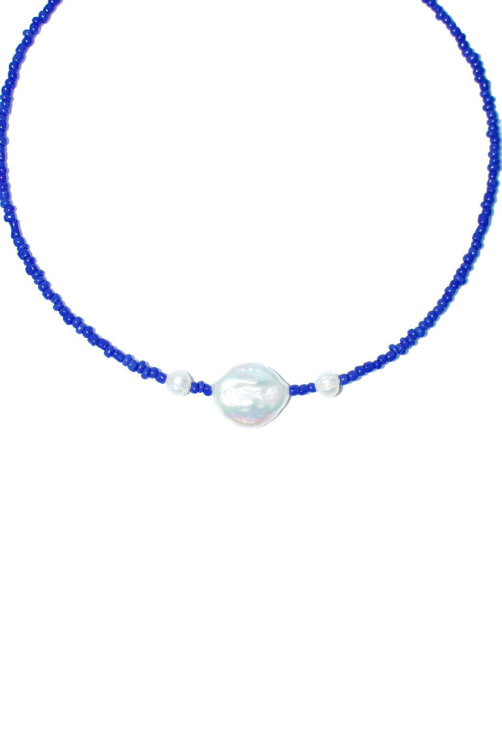 Blue Japanese glass beads surround freshwater pearls, an ode to the sea. Zoomed in view