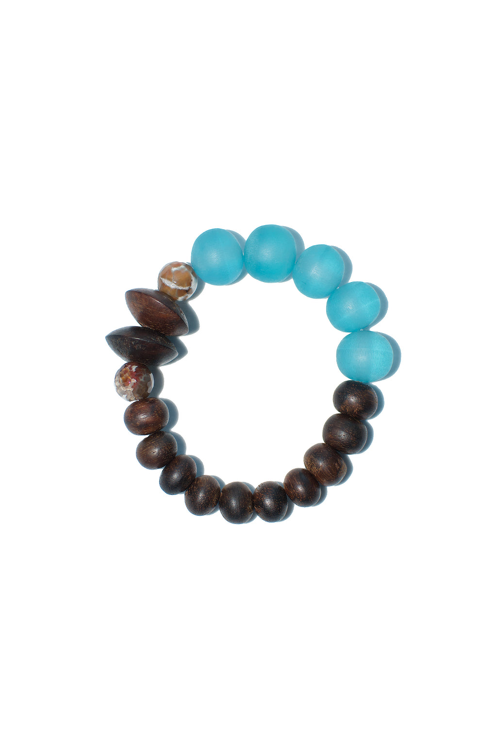 A chunky stretch bracelet from Anouk Gania featuring reclaimed wooden beads, semi-precious agate stones and translucent blue resin beads.&nbsp;  Stretchy elastic bracelet fits most.  Handmade in Australia.