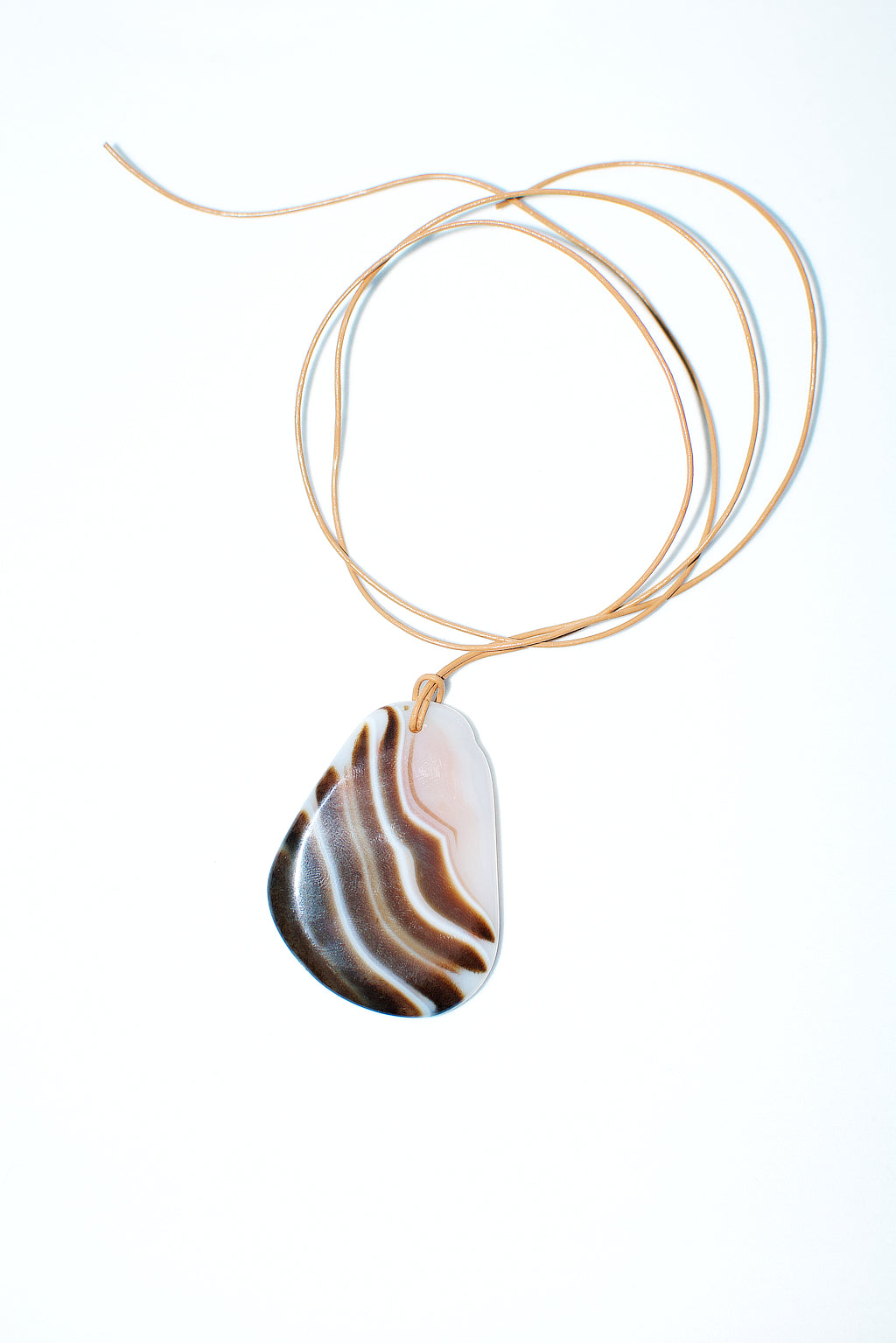 Agate gemstone on genuine leather cord. One of a kind  35mm medallion  40cm adjustable genuine tan leather cord  Strung in Australia by Anouk Gania